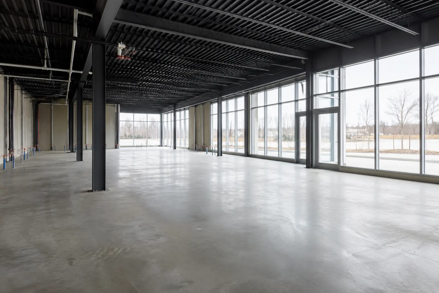 New Commercial Building Construction across Maple property by Ardenvale Construction